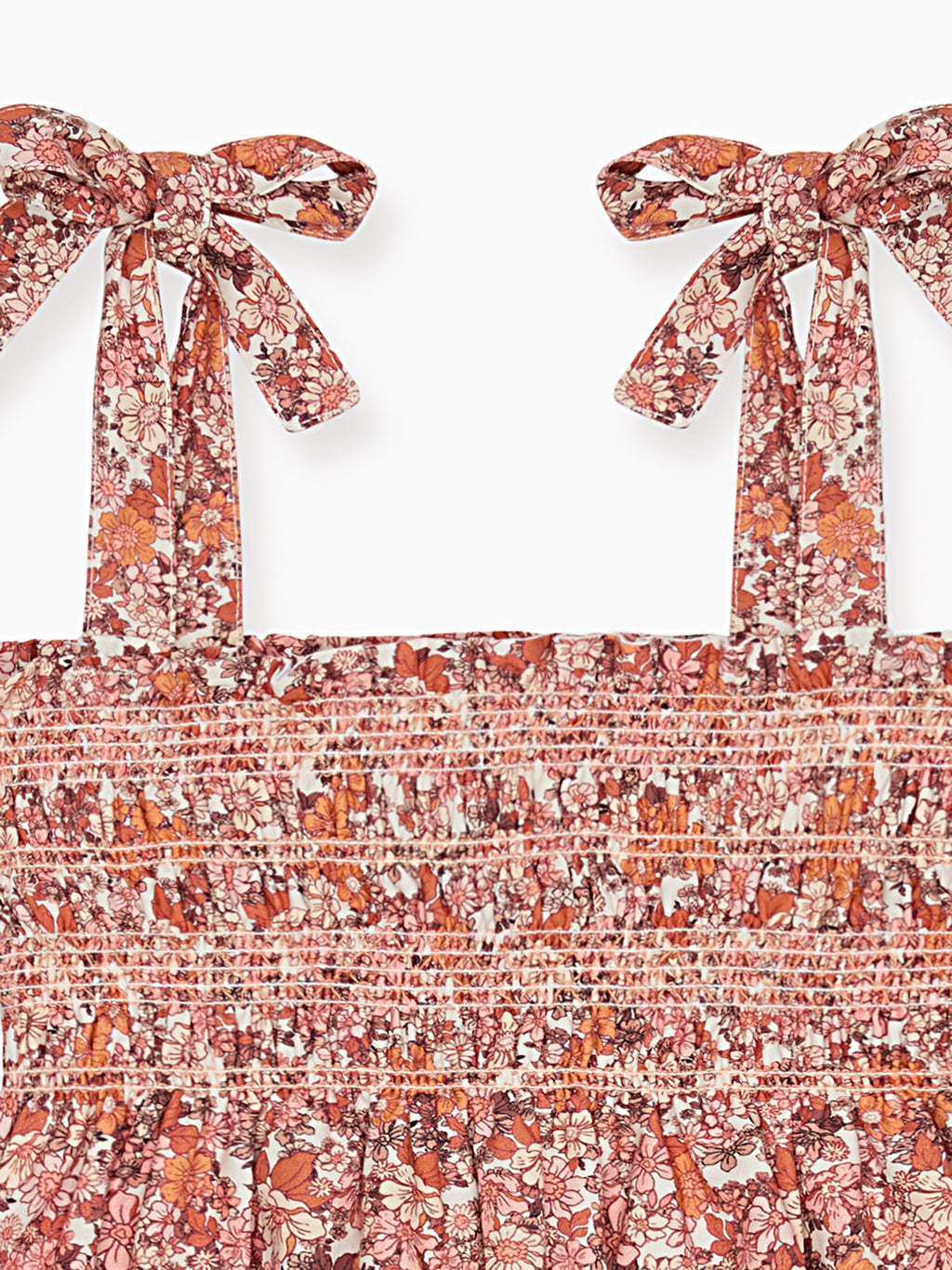 Robe fillette smockée à la main en coton terracotta imprimé floral