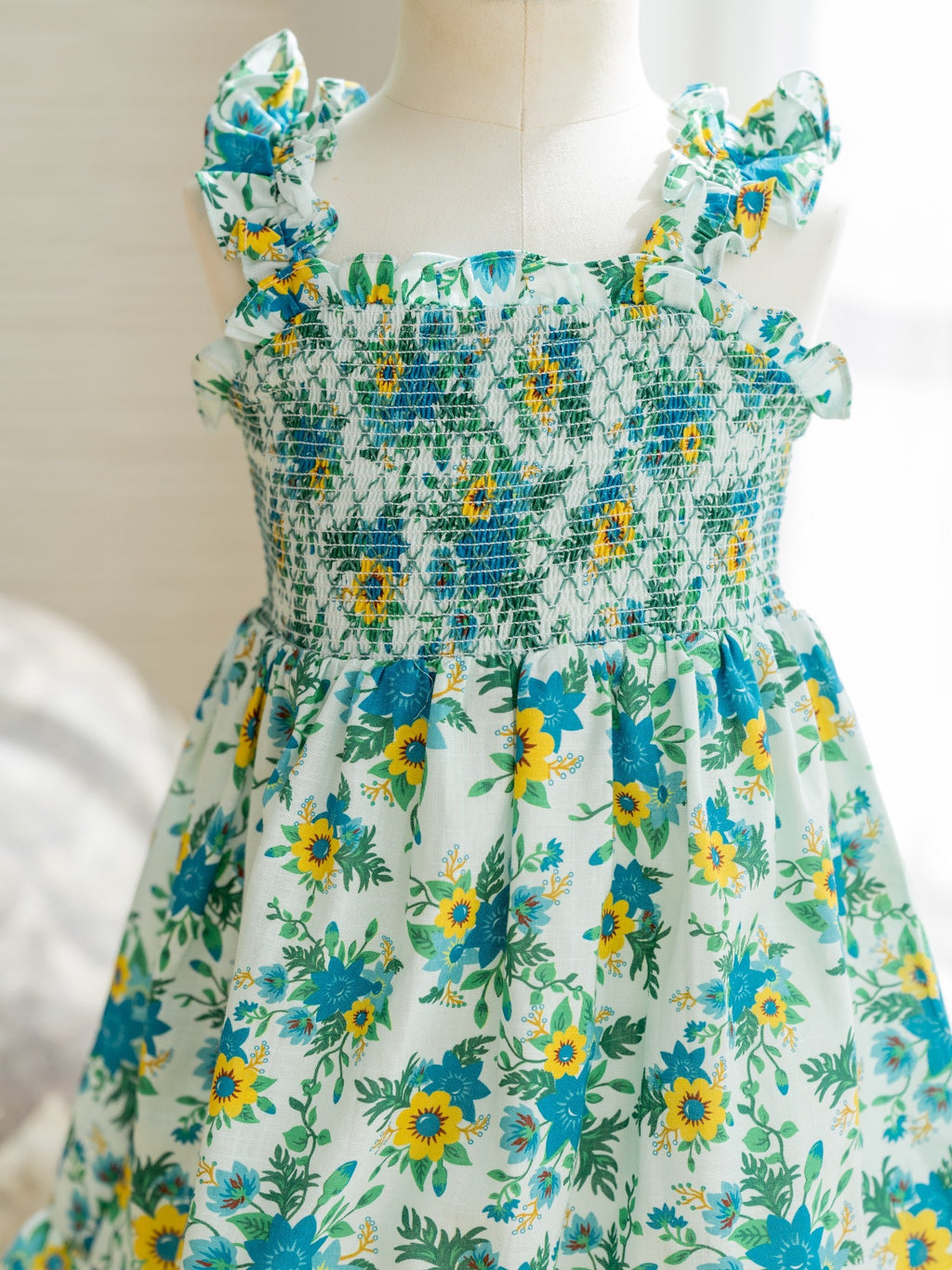 Robe smockée à motifs floraux verts pour fille